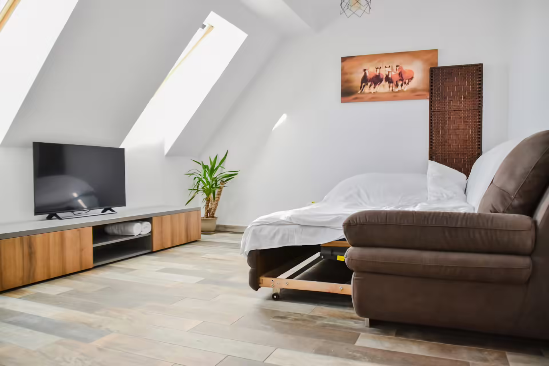 Apartament la mansardă cu canapea extensibilă și televizor la Berg House 31 Apartament la mansardă cu canapea extensibilă și televizor la Berg House 31